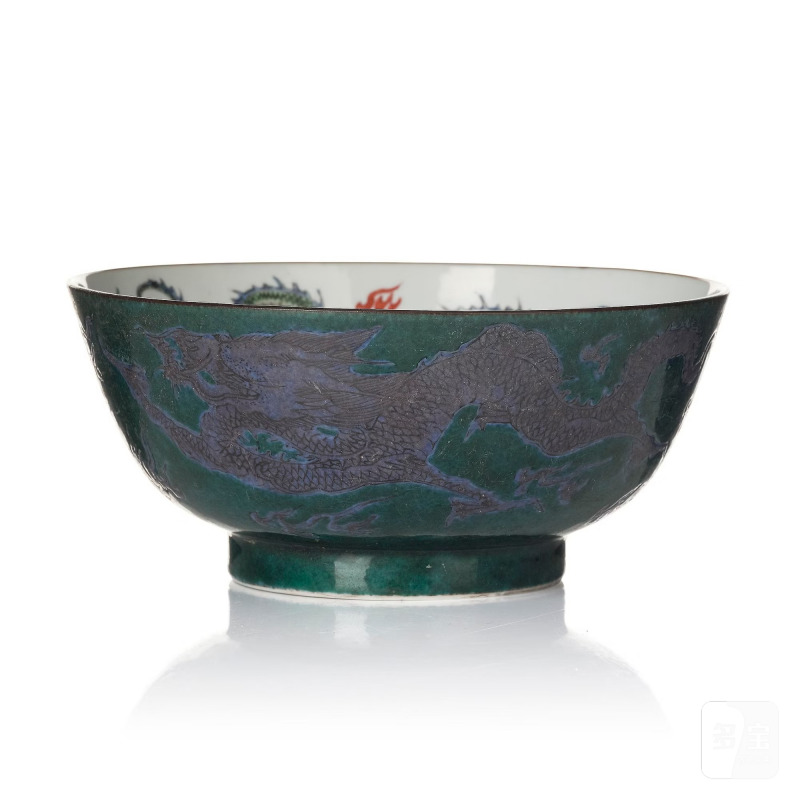 A rare green ground 'dragon and phoenix' bowl,